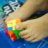 Nogama i s povezom na očima natjecali se u slaganju Rubikove kocke
